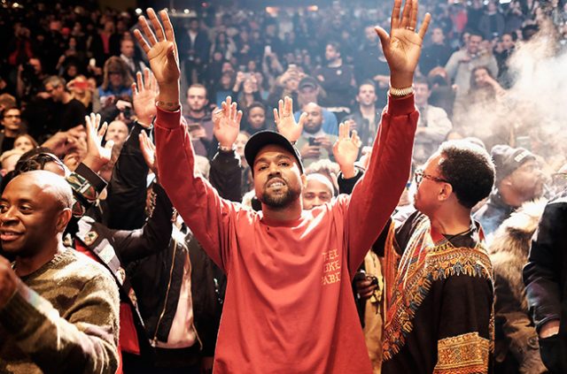 Kanye-West-yeezy-msg-hands-up-2016-billboard-650